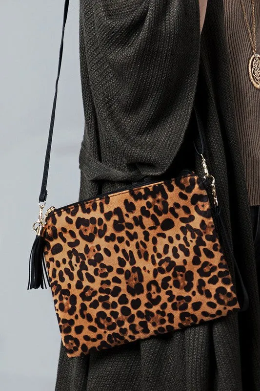 Animal print wristlet with tassel cross body/clutch bag