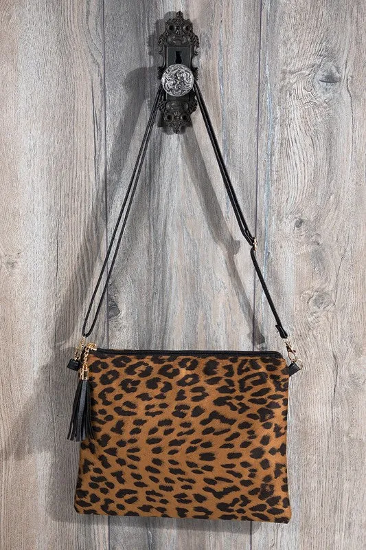 Animal print wristlet with tassel cross body/clutch bag