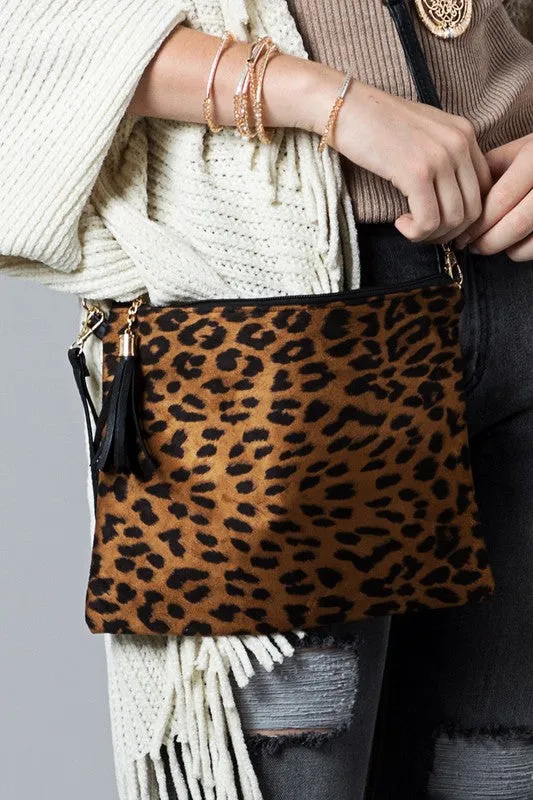 Animal print wristlet with tassel cross body/clutch bag