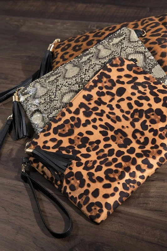 Animal print wristlet with tassel cross body/clutch bag